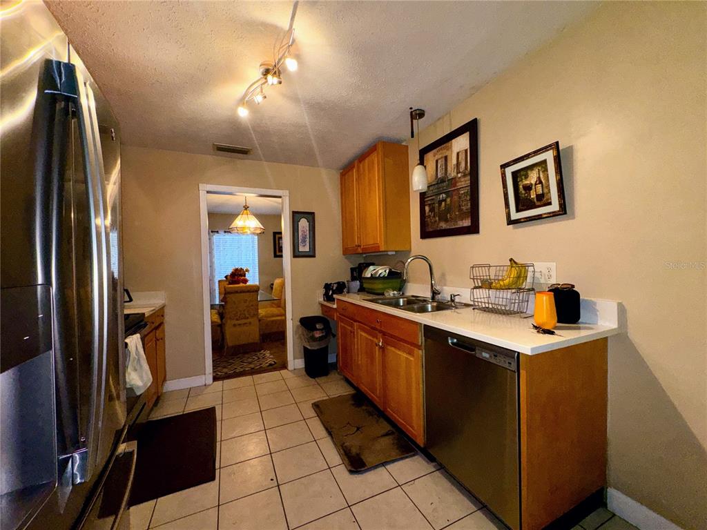 2908 Forest Circle Seffner, FL 33584 - Photo 16 of 46 a kitchen with a sink appliances and cabinets
