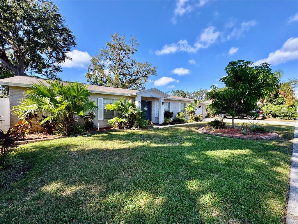 2908 Forest Circle Seffner, FL 33584 - Photo 2 of 46 a front view of a house with a garden