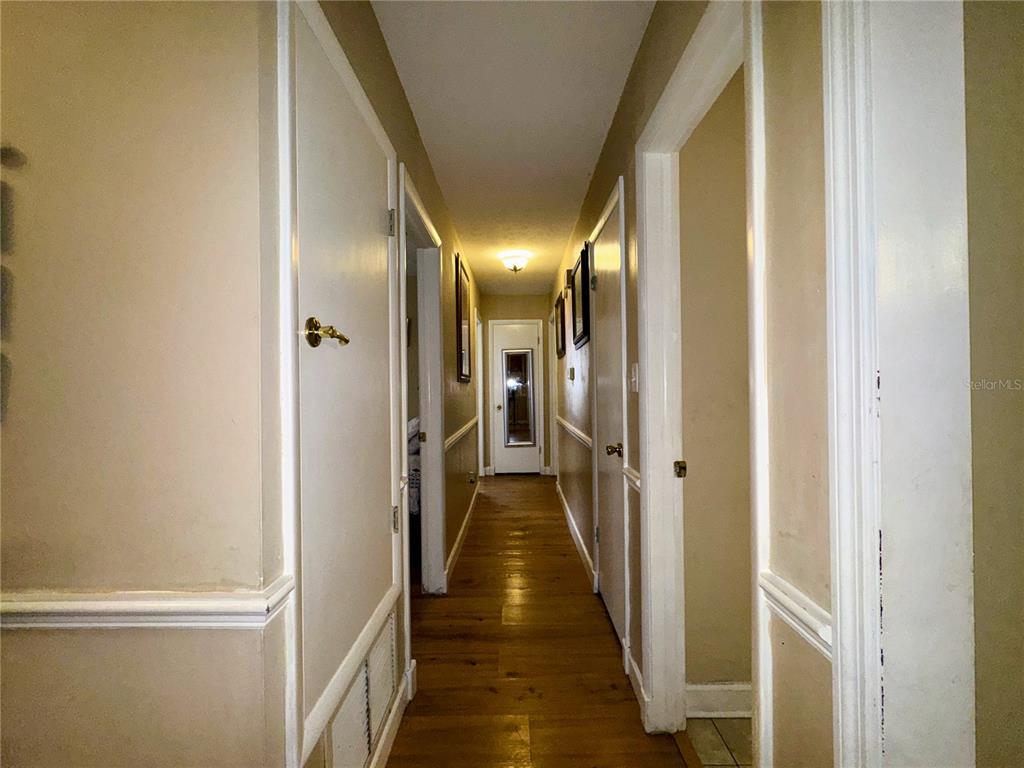 2908 Forest Circle Seffner, FL 33584 - Photo 23 of 46 a view of gallery with wooden floor