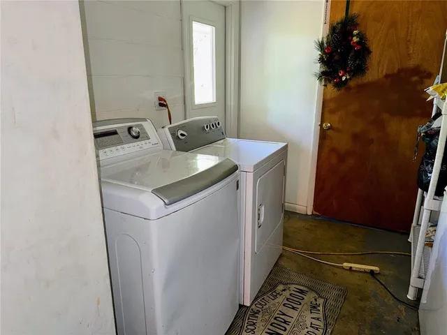 a room with furniture and a window