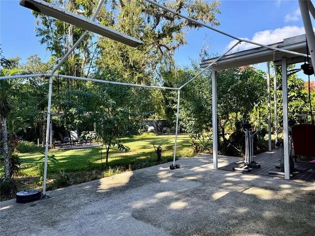 a view of a car park in front of house