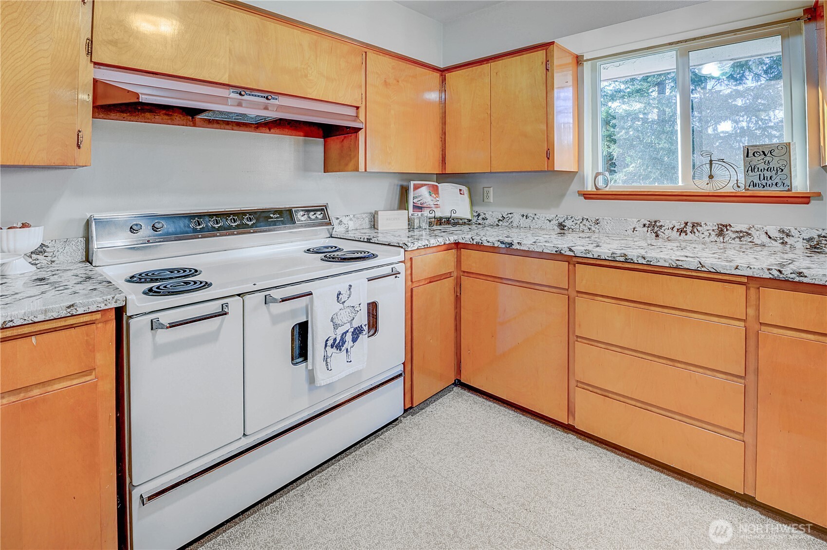 20221 Church Lake Road East Bonney Lake, WA 98391 - Photo 13 of 37 a kitchen with granite countertop cabinets stainless steel appliances and a sink