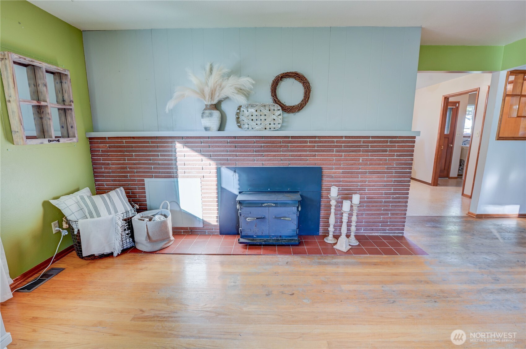 20221 Church Lake Road East Bonney Lake, WA 98391 - Photo 8 of 37 a living room with furniture and a fireplace