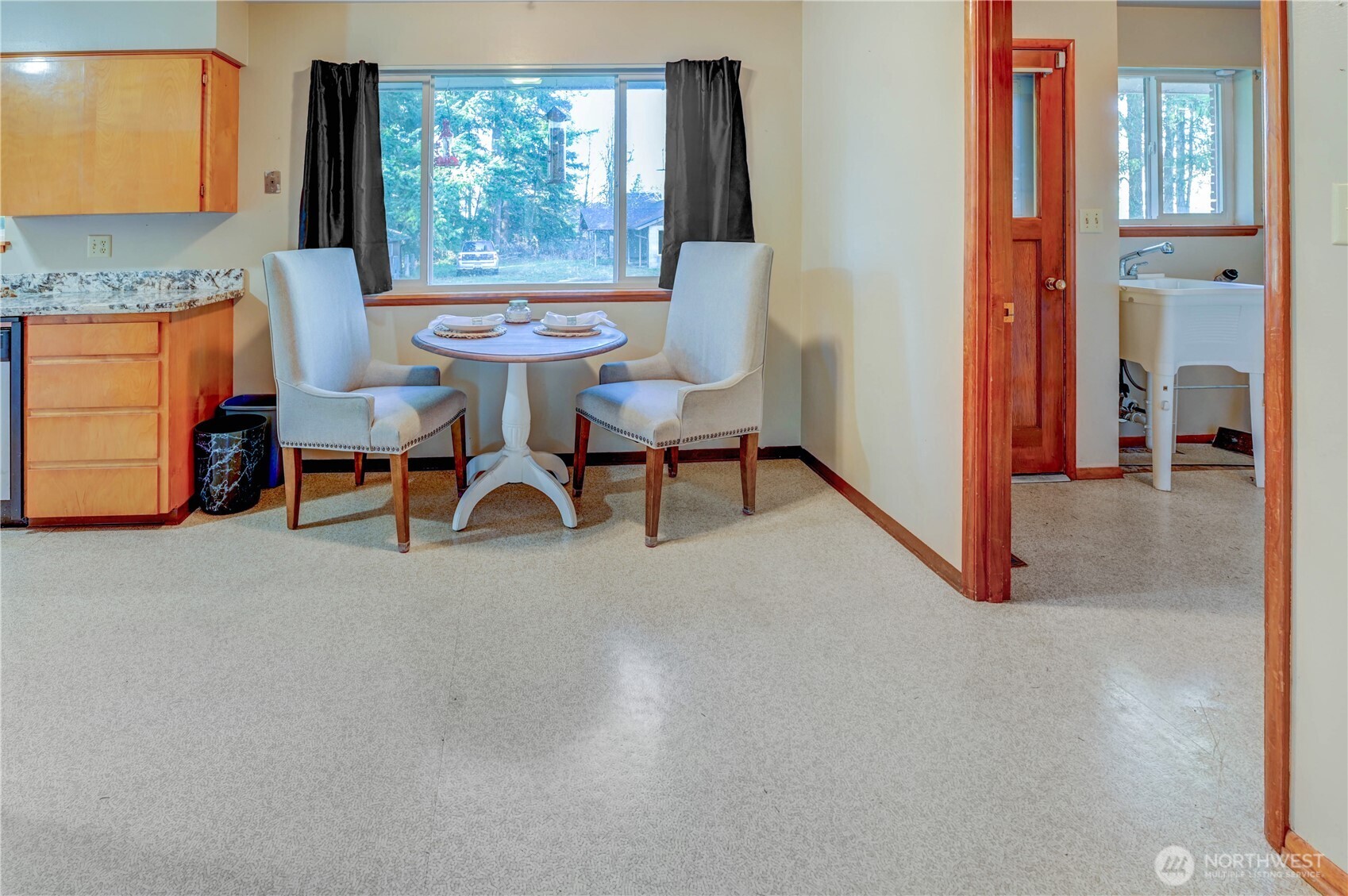 20221 Church Lake Road East Bonney Lake, WA 98391 - Photo 9 of 37 a dining room with furniture and window