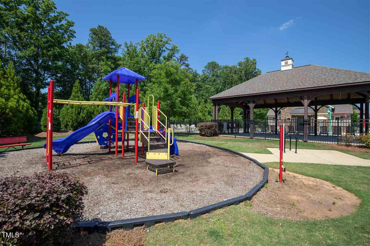 2452 Baslow Drive Apex, NC 27539 - Photo 24 of 25 a view of a park with slide