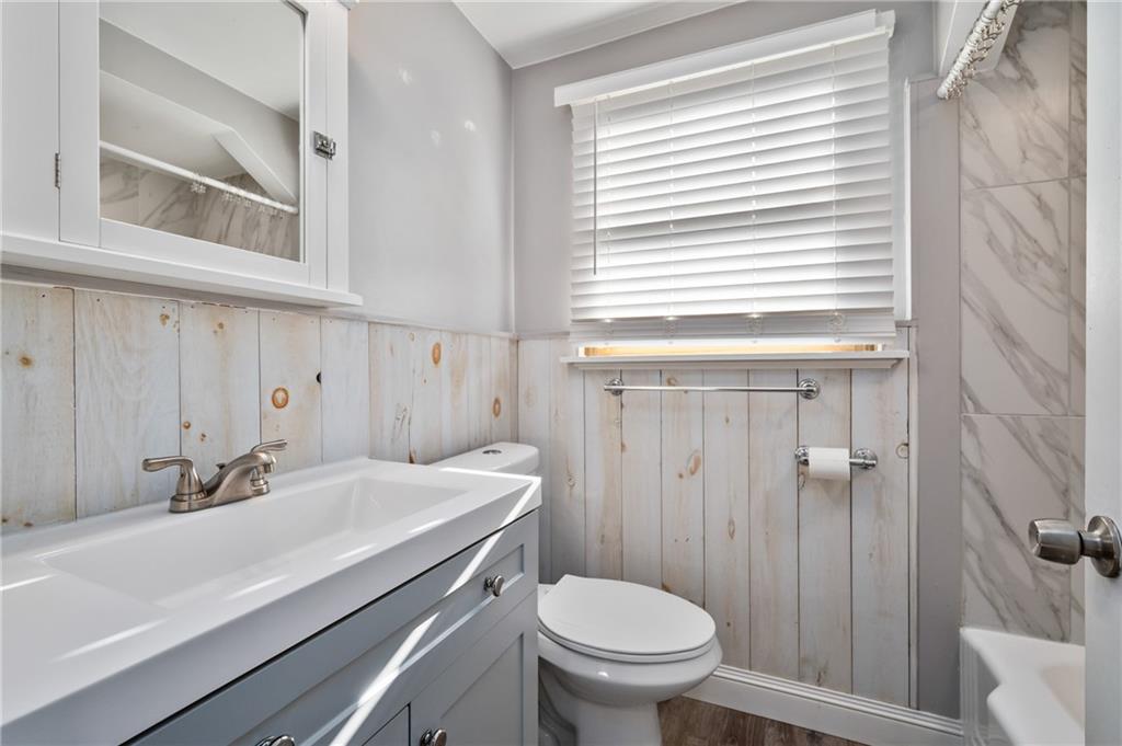 1430 James Street Monroeville, PA 15146 - Photo 13 of 36 a bathroom with a sink a toilet and shower