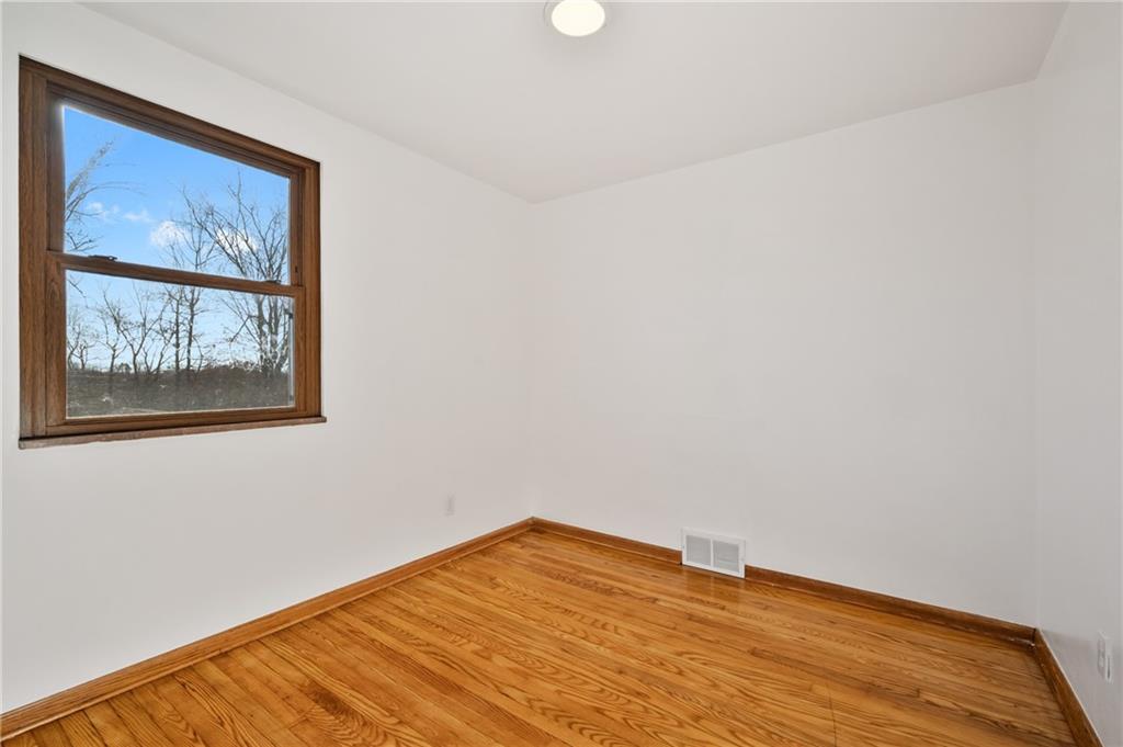 1430 James Street Monroeville, PA 15146 - Photo 19 of 36 a view of empty room with wooden floor