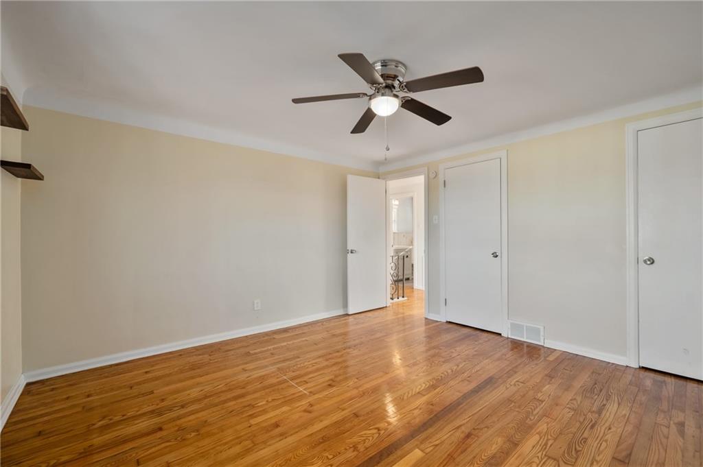 1430 James Street Monroeville, PA 15146 - Photo 22 of 36 a view of an empty room and wooden floor