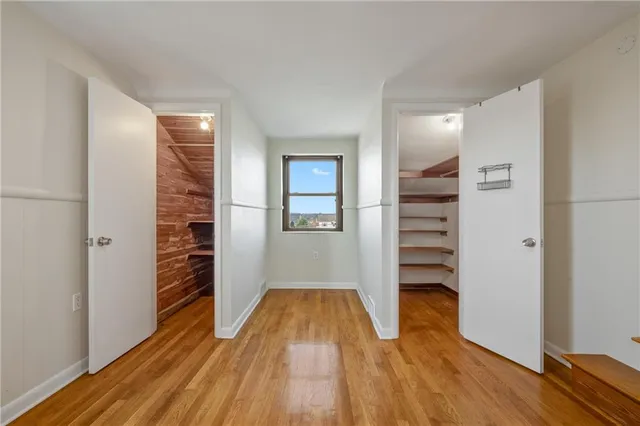 a view of wooden floor in an empty room