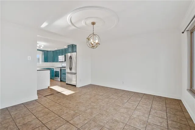 a view of a kitchen with furniture and a kitchen