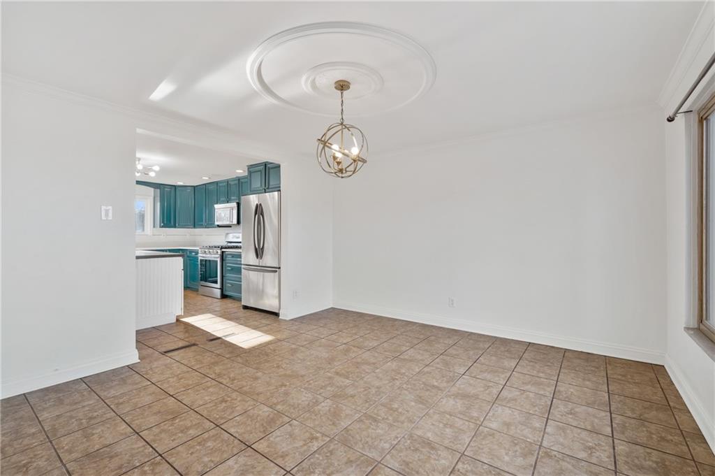 1430 James Street Monroeville, PA 15146 - Photo 6 of 36 a view of a kitchen with furniture and a kitchen