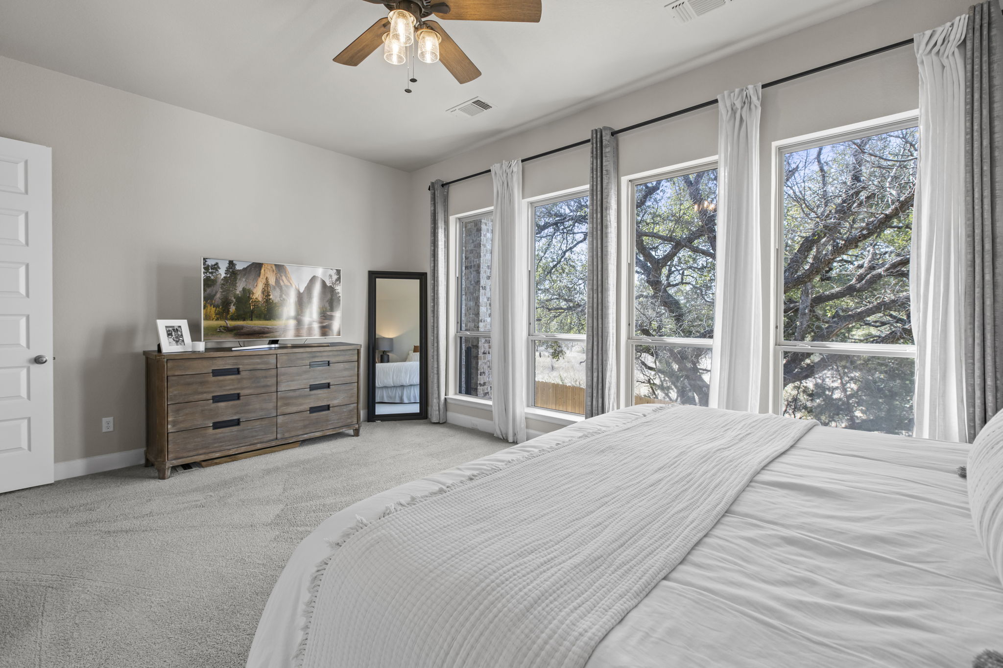 313 Terrene Trail Georgetown, TX 78628 - Photo 13 of 40 Bedroom with carpet floors and a ceiling fan