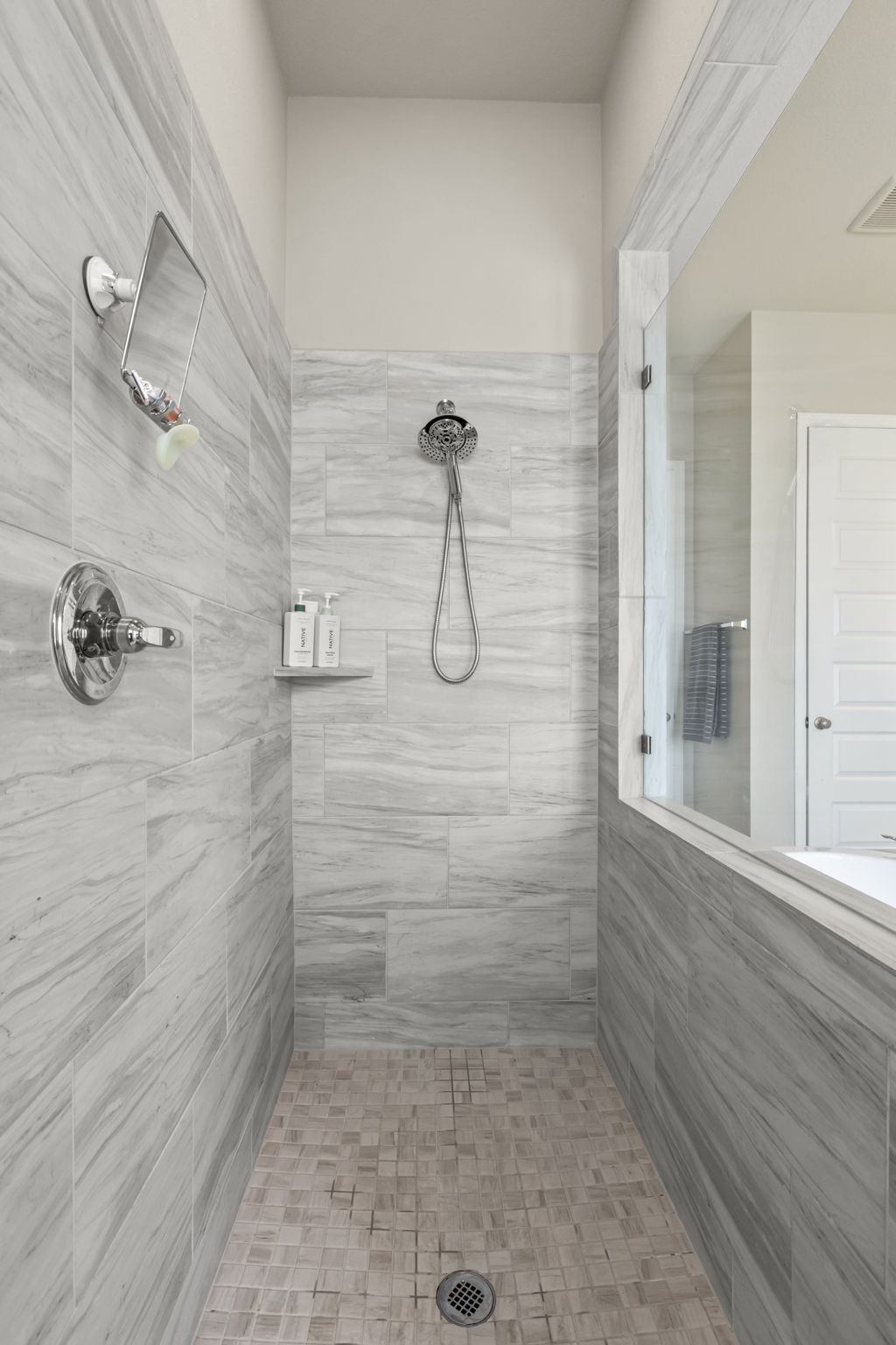 313 Terrene Trail Georgetown, TX 78628 - Photo 18 of 40 Full bath with a tile shower