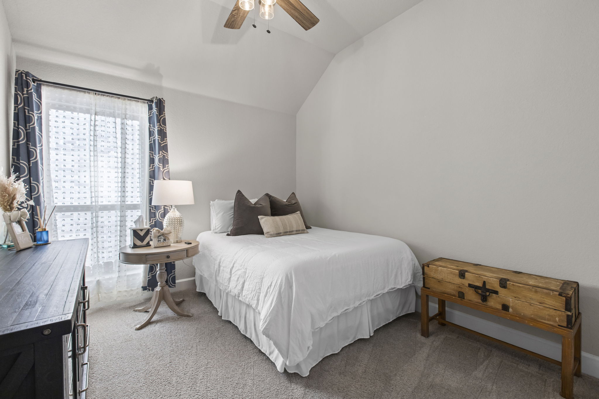 313 Terrene Trail Georgetown, TX 78628 - Photo 21 of 40 Carpeted bedroom with lofted ceiling and a ceiling fan