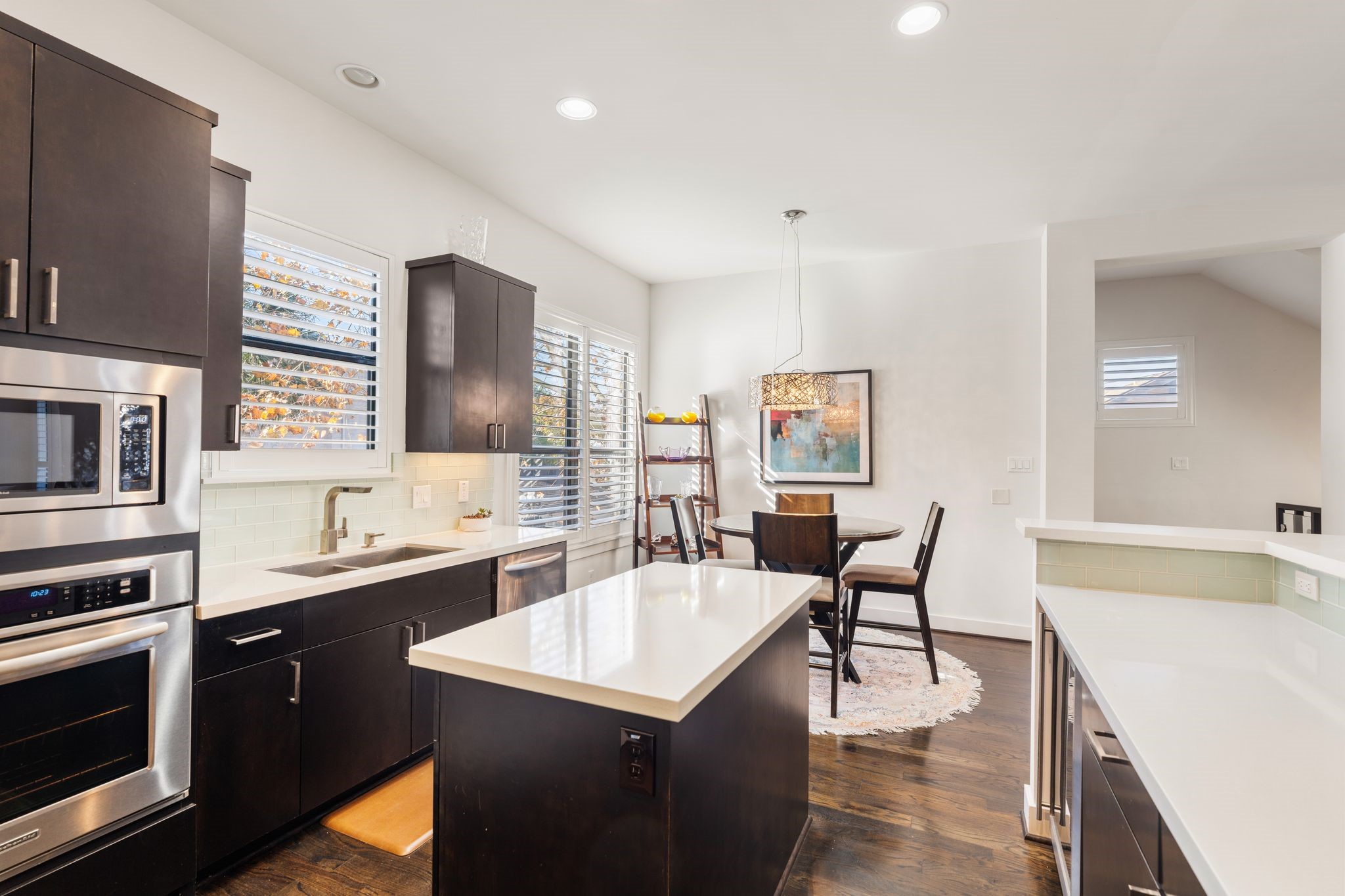 5911 Rose Street Houston, TX 77007 - Photo 9 of 35 Modern finishes, ample counter space, and functional layout designed for both cooking and entertaining.