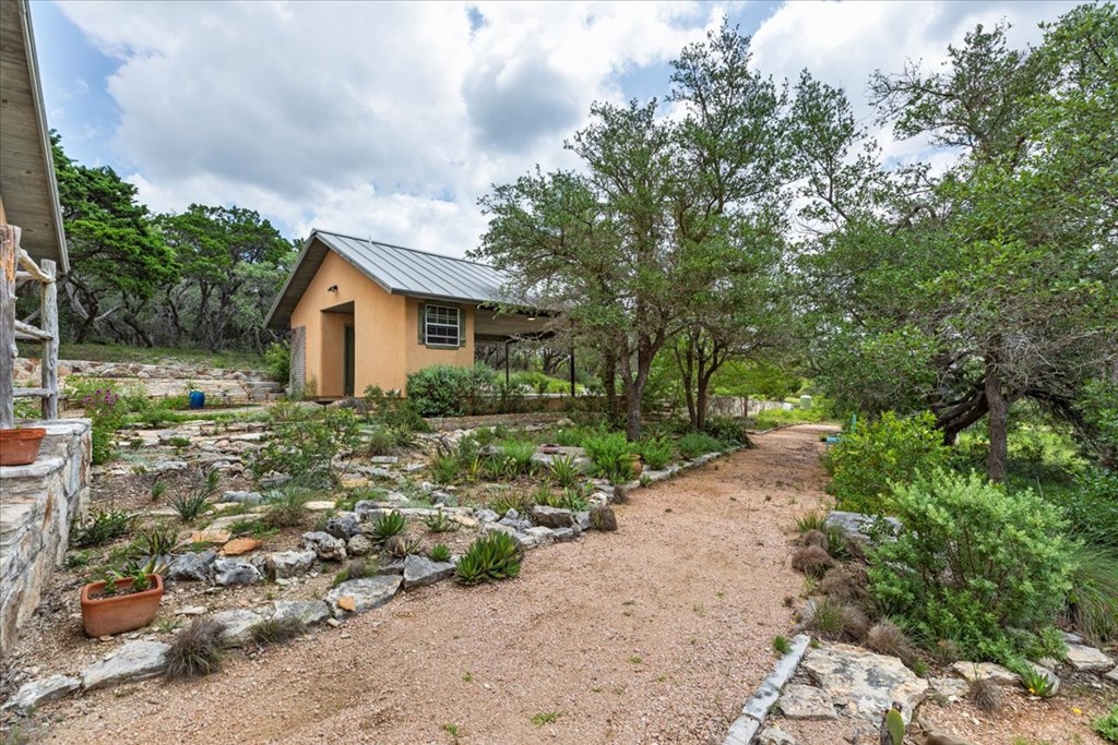 4946 Ranch Road Dripping Springs, TX 78620 - Photo 51 of 64 walkway house from carport