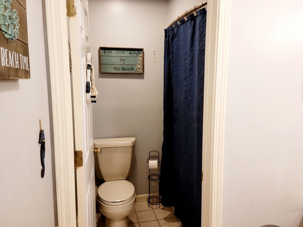 493 Northridge Drive Decatur, TN 37322 - Photo 28 of 43 a bathroom with a toilet and a shower