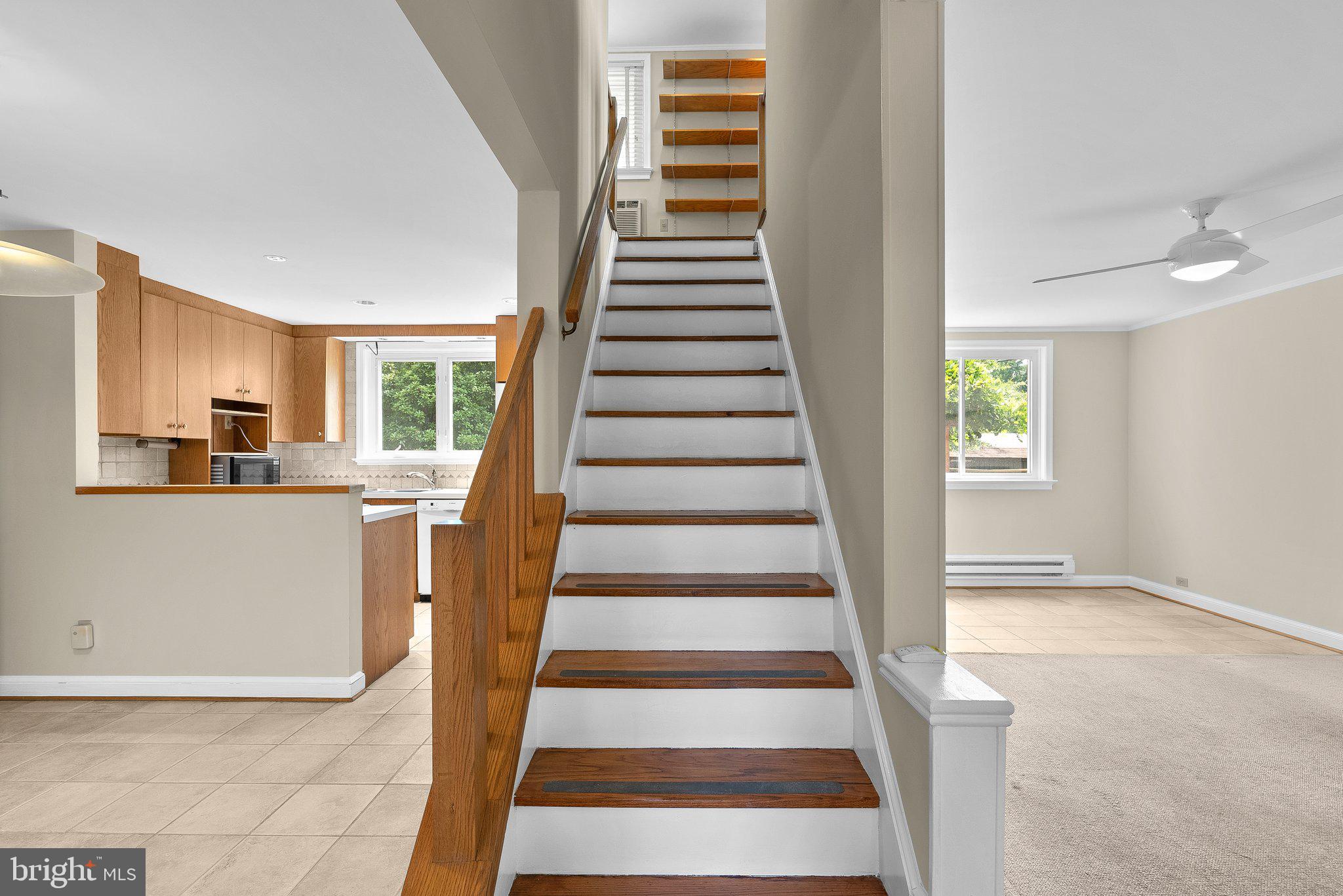 17 Ridge Road Greenbelt, MD 20770 - Photo 8 of 35 Stairway to Upper Lvl/View of DR, LR & Kitchen