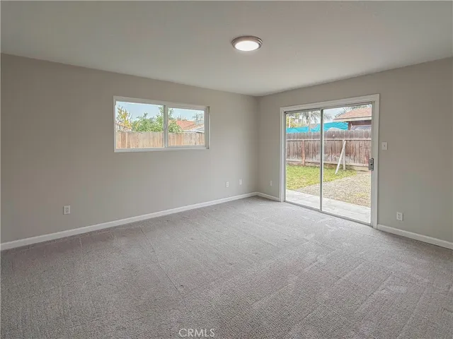 an empty room with a sliding door