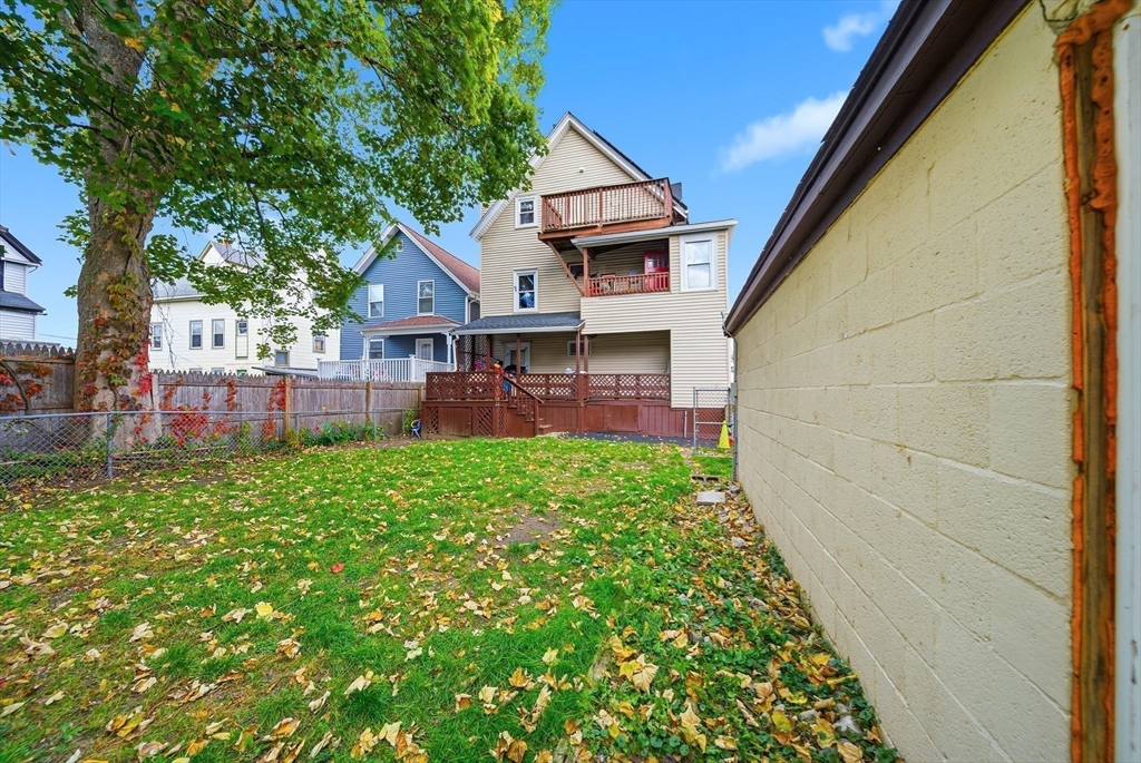 94 Sheridan Street Lynn, MA 01902 - Photo 30 of 33 a front view of a house with a yard
