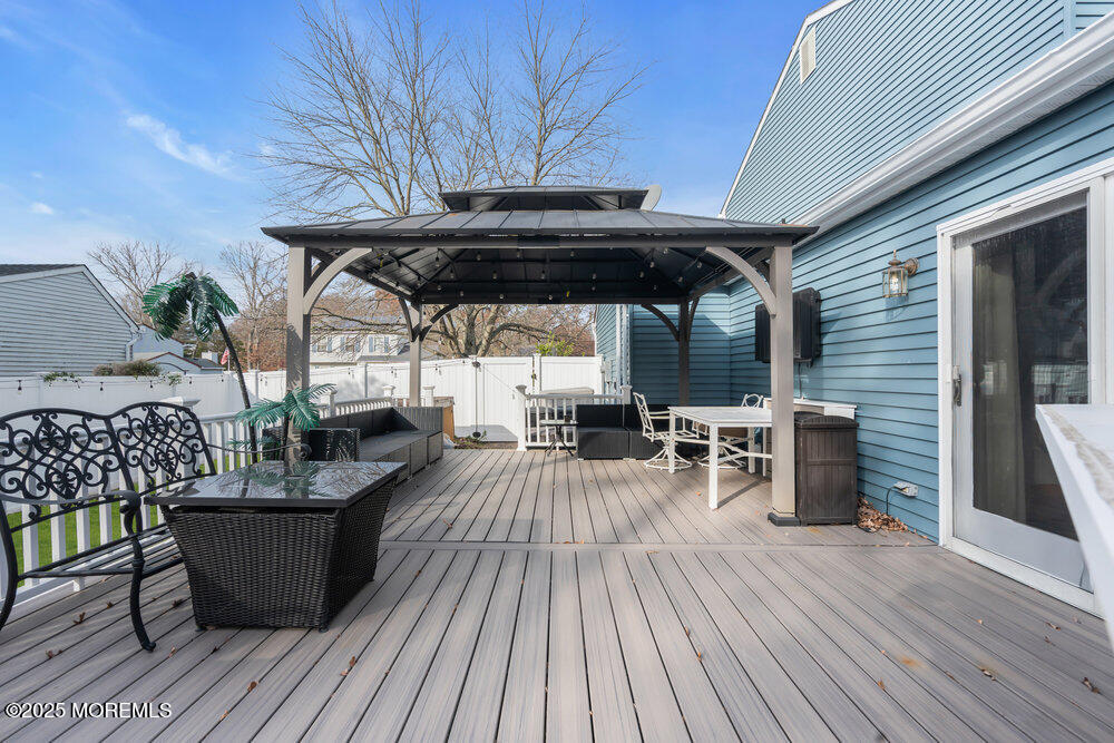25 Concord Circle Howell, NJ 07731 - Photo 18 of 26 a view of a chairs and table on the wooden floor