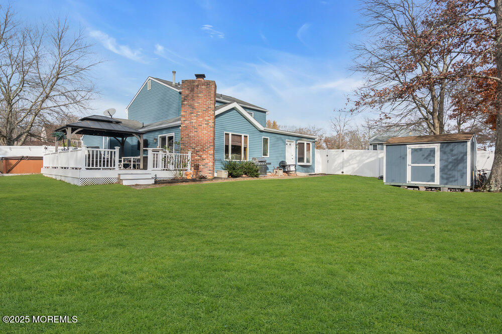 25 Concord Circle Howell, NJ 07731 - Photo 19 of 26 a front view of house with a garden