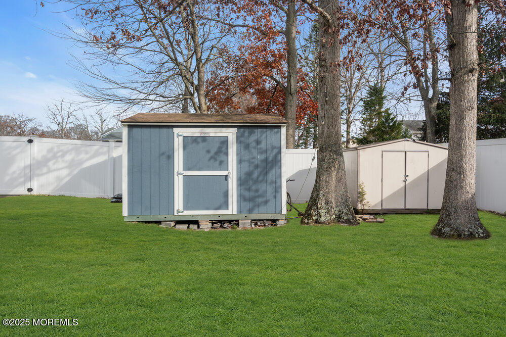 25 Concord Circle Howell, NJ 07731 - Photo 20 of 26 a front view of house with garden