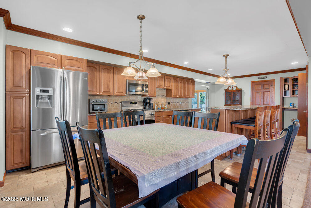 25 Concord Circle Howell, NJ 07731 - Photo 6 of 26 a view of a dining room with furniture
