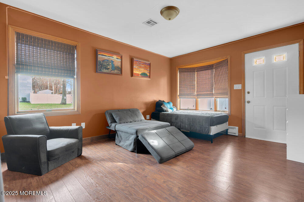 25 Concord Circle Howell, NJ 07731 - Photo 10 of 26 a living room with furniture and a window