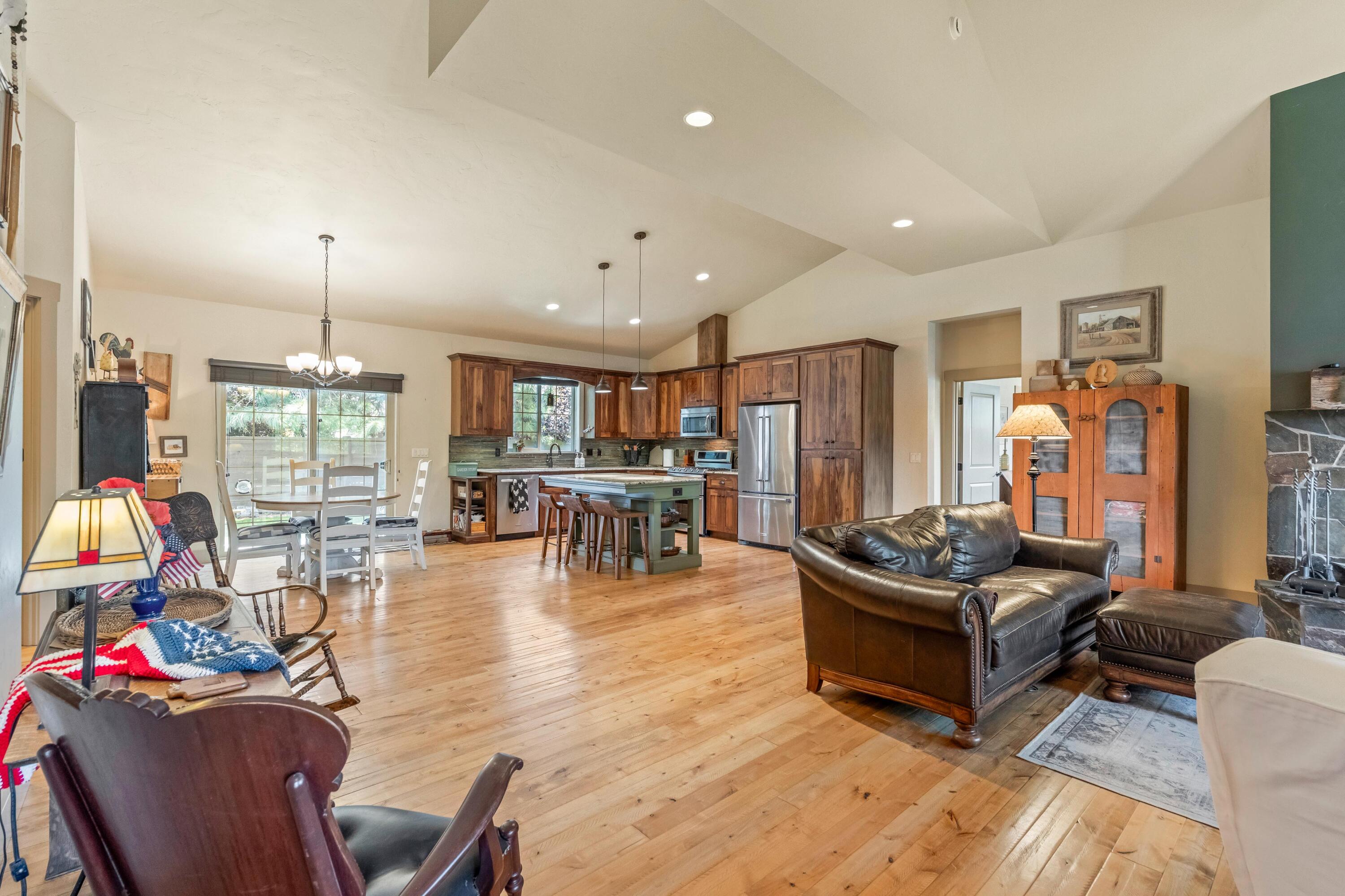 210 Northwest Saddle Ridge Loop Prineville, OR 97754 - Photo 3 of 38 a living room with furniture and a flat screen tv