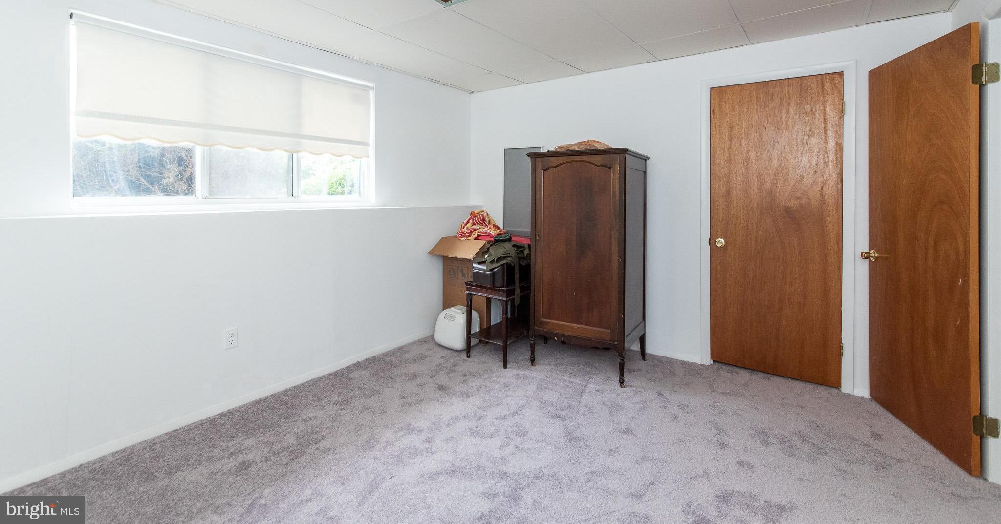 247 Sandhill Road Baltimore, MD 21221 - Photo 24 of 41 Basement bedroom