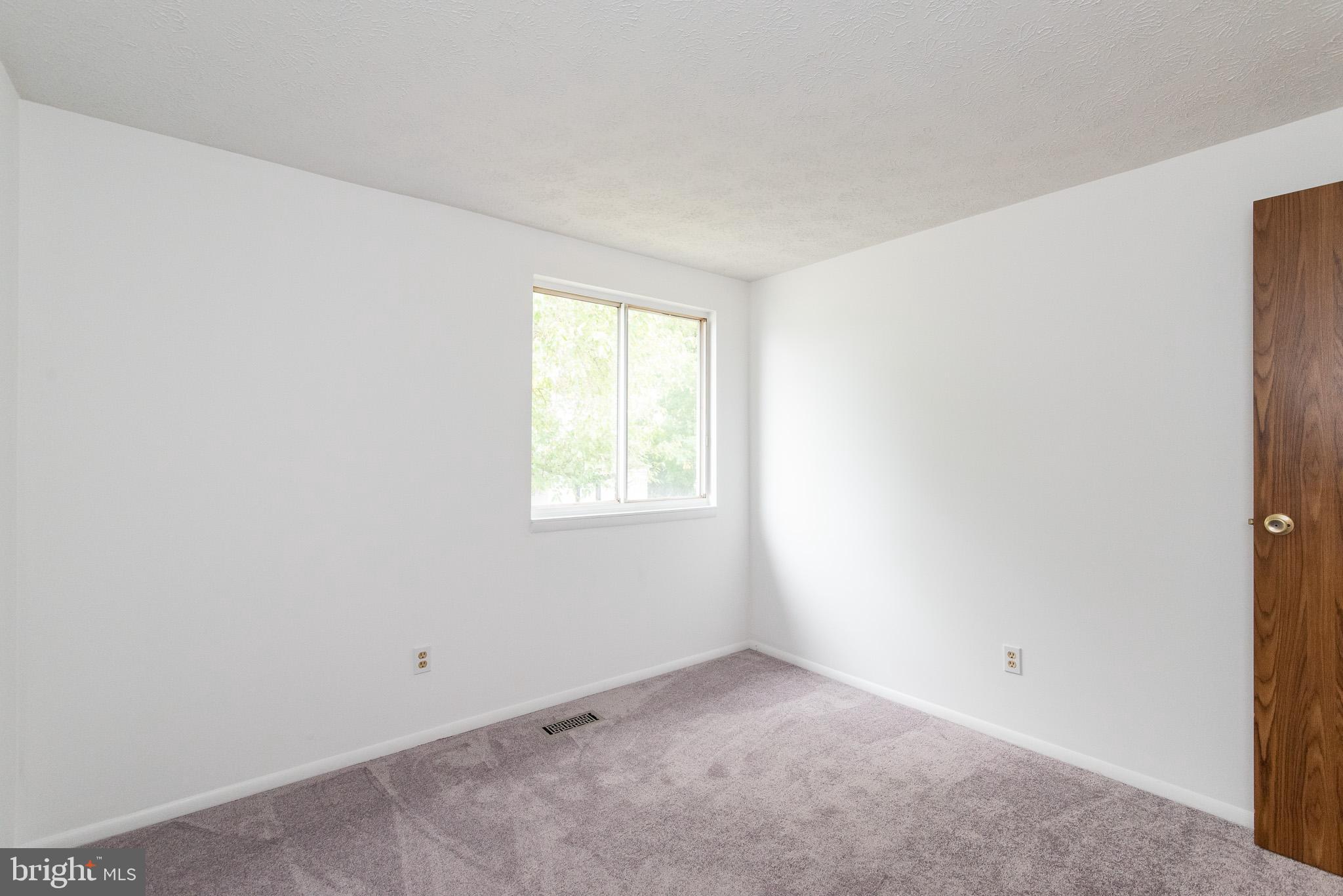 247 Sandhill Road Baltimore, MD 21221 - Photo 27 of 41 main level bedroom 2