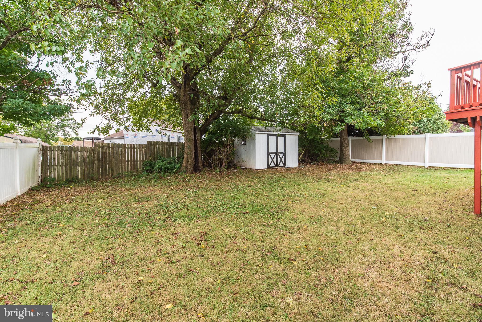247 Sandhill Road Baltimore, MD 21221 - Photo 37 of 41 Private yard with shed