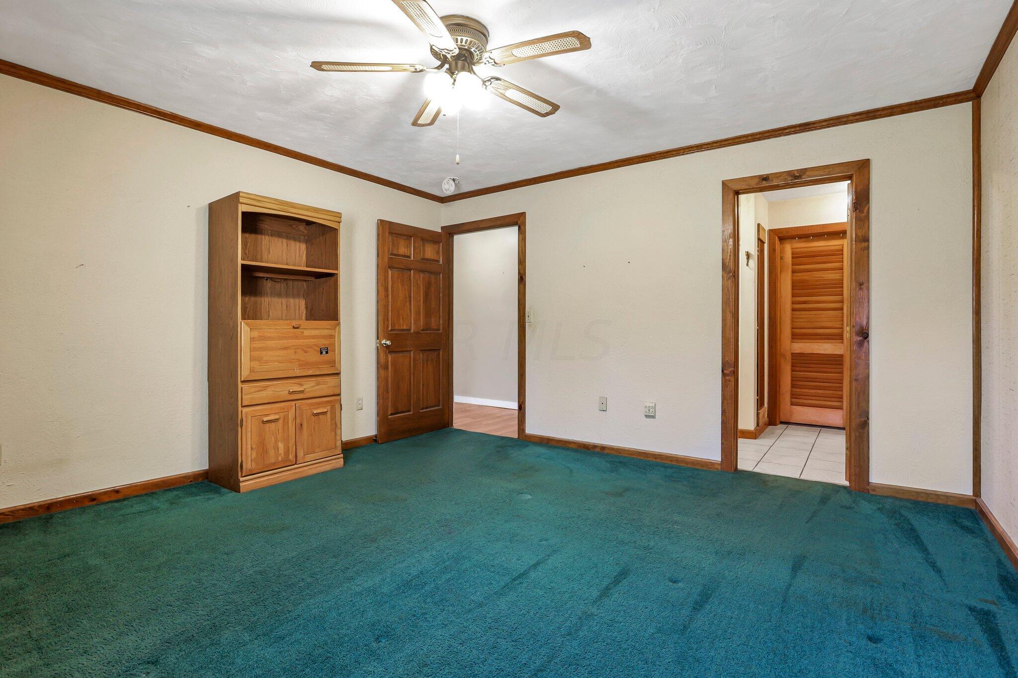 5225 Deeds Road Southwest Pataskala, OH 43062 - Photo 16 of 43 1st floor owner's bedroom w/attached bath