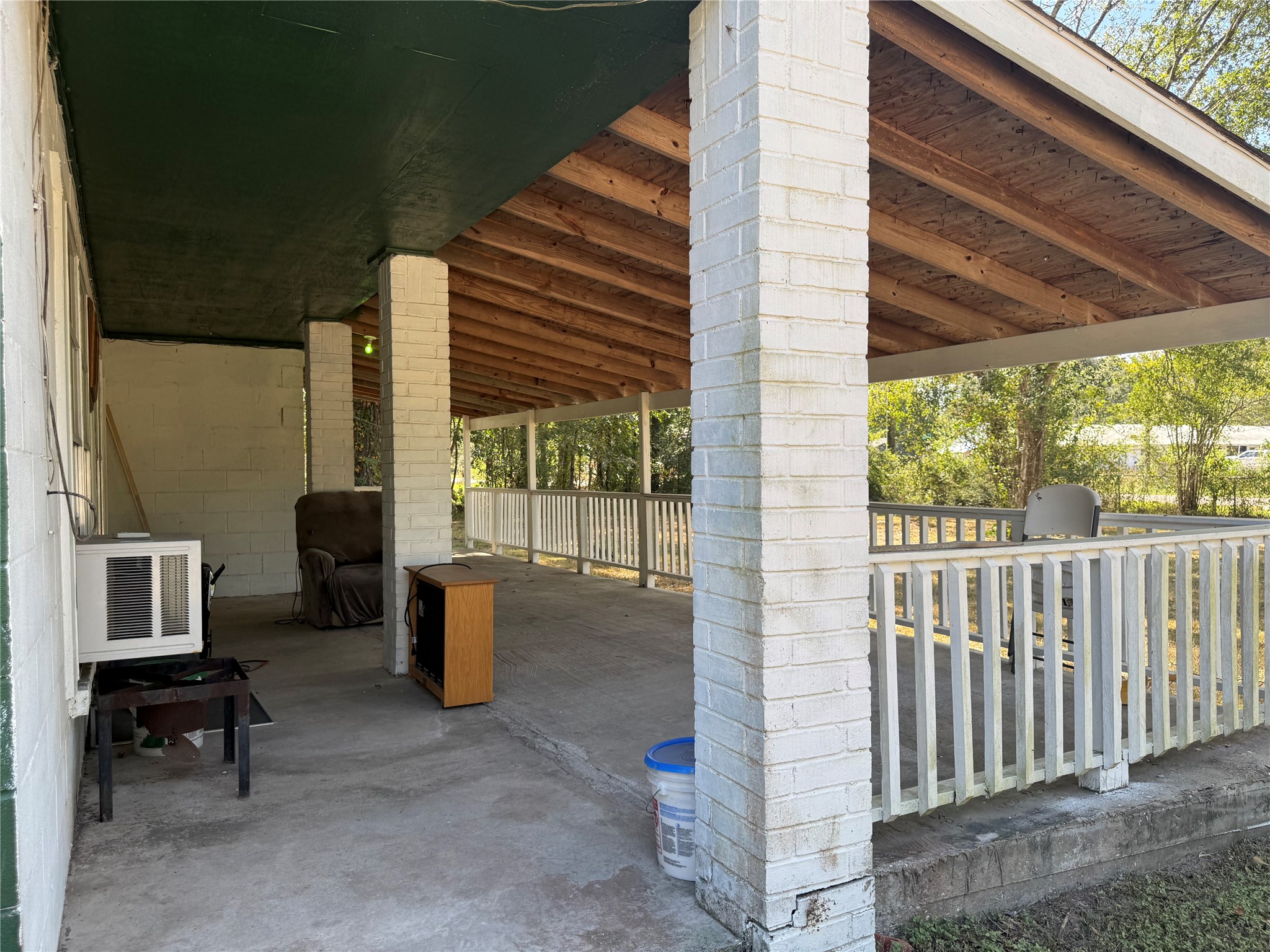 20785 Deuster Lane Porter, TX 77365 - Photo 4 of 28 a view of a patio with chair and table