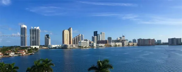 a view of a city with tall buildings