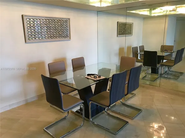 a view of a workspace with furniture