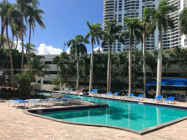 a view of outdoor space with swimming pool and patio