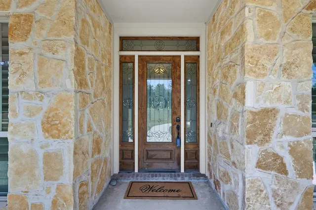 a room with furniture and wooden floor