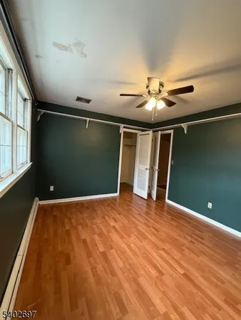 a view of a kitchen with cabinets