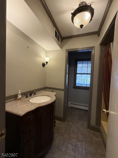 46 Whippoorwill Lane Sparta, NJ 07871 - Photo 19 of 20 a bathroom with a sink and a mirror