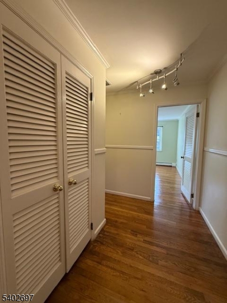 46 Whippoorwill Lane Sparta, NJ 07871 - Photo 6 of 20 a view of a hallway with wooden floor