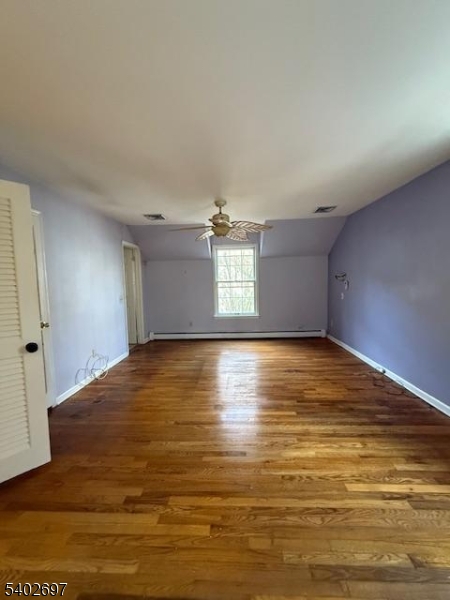 46 Whippoorwill Lane Sparta, NJ 07871 - Photo 7 of 20 a view of empty room with wooden floor and window