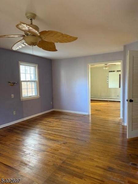 46 Whippoorwill Lane Sparta, NJ 07871 - Photo 9 of 20 a view of an empty room and window