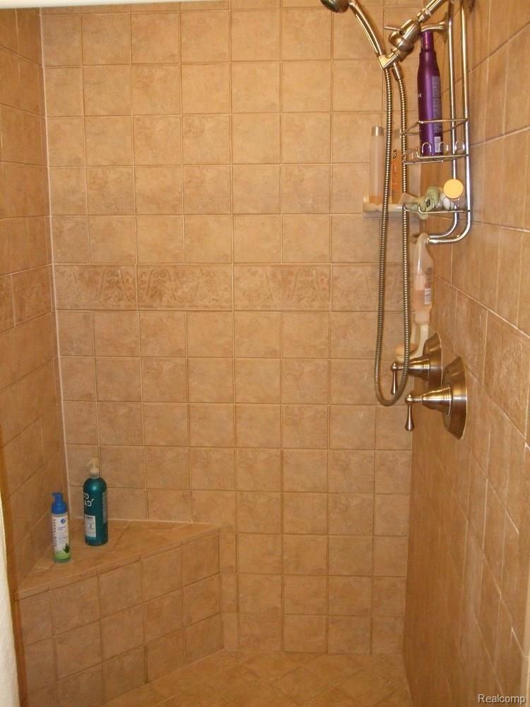 9920 Reeck Road Allen Park, MI 48101 - Photo 32 of 39 MASTER BEDROOM BATH CERAMIC TILE SHOWER.