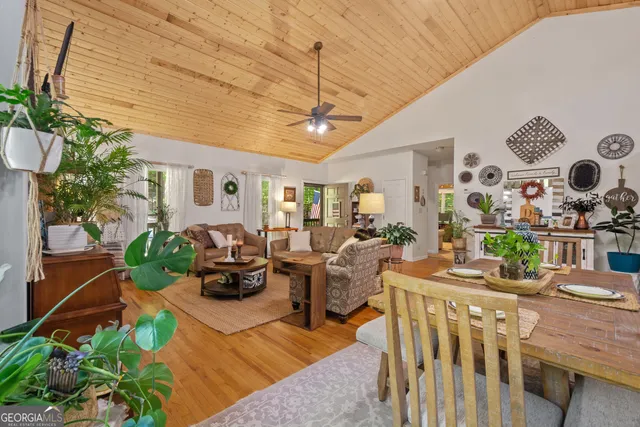 a work room with furniture and a window