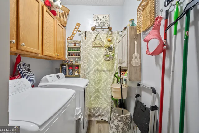 a bedroom with furniture and a chandelier