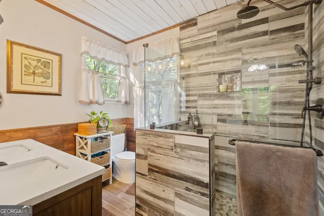 a view of a forest with a yard