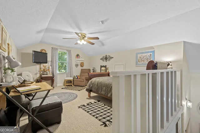 a view of a yard with large trees