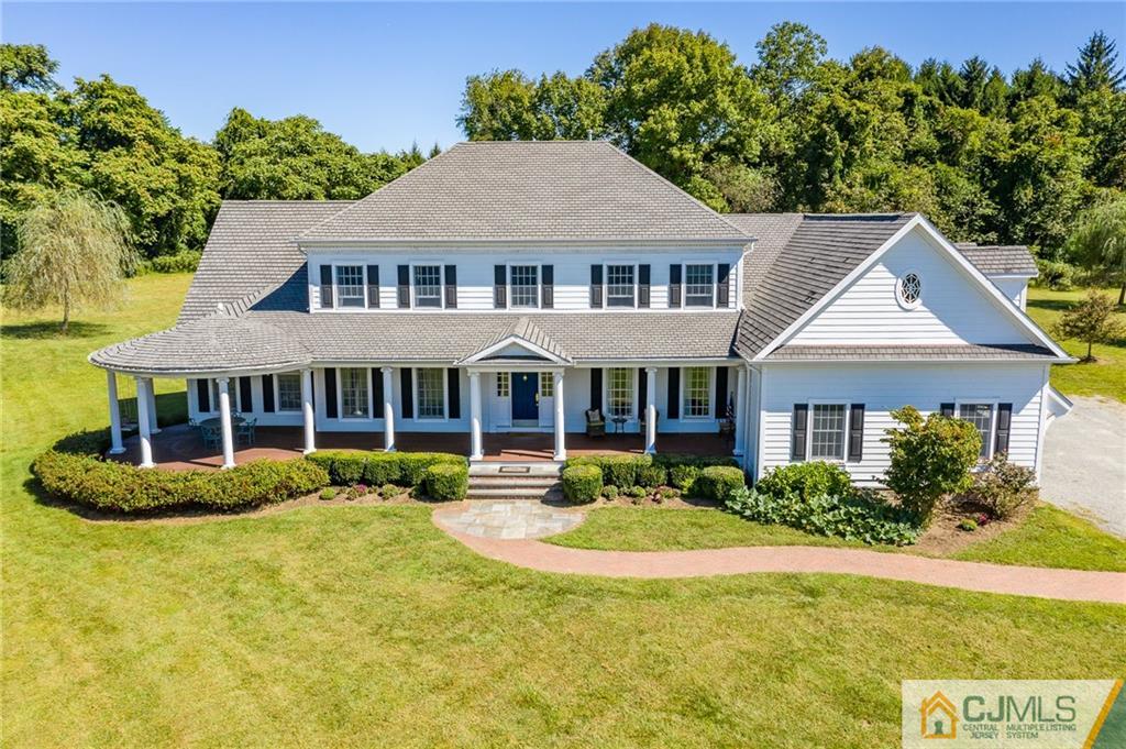 40 Pickle Road Califon, NJ 07830 - Photo 1 of 50 a front view of a house with a yard